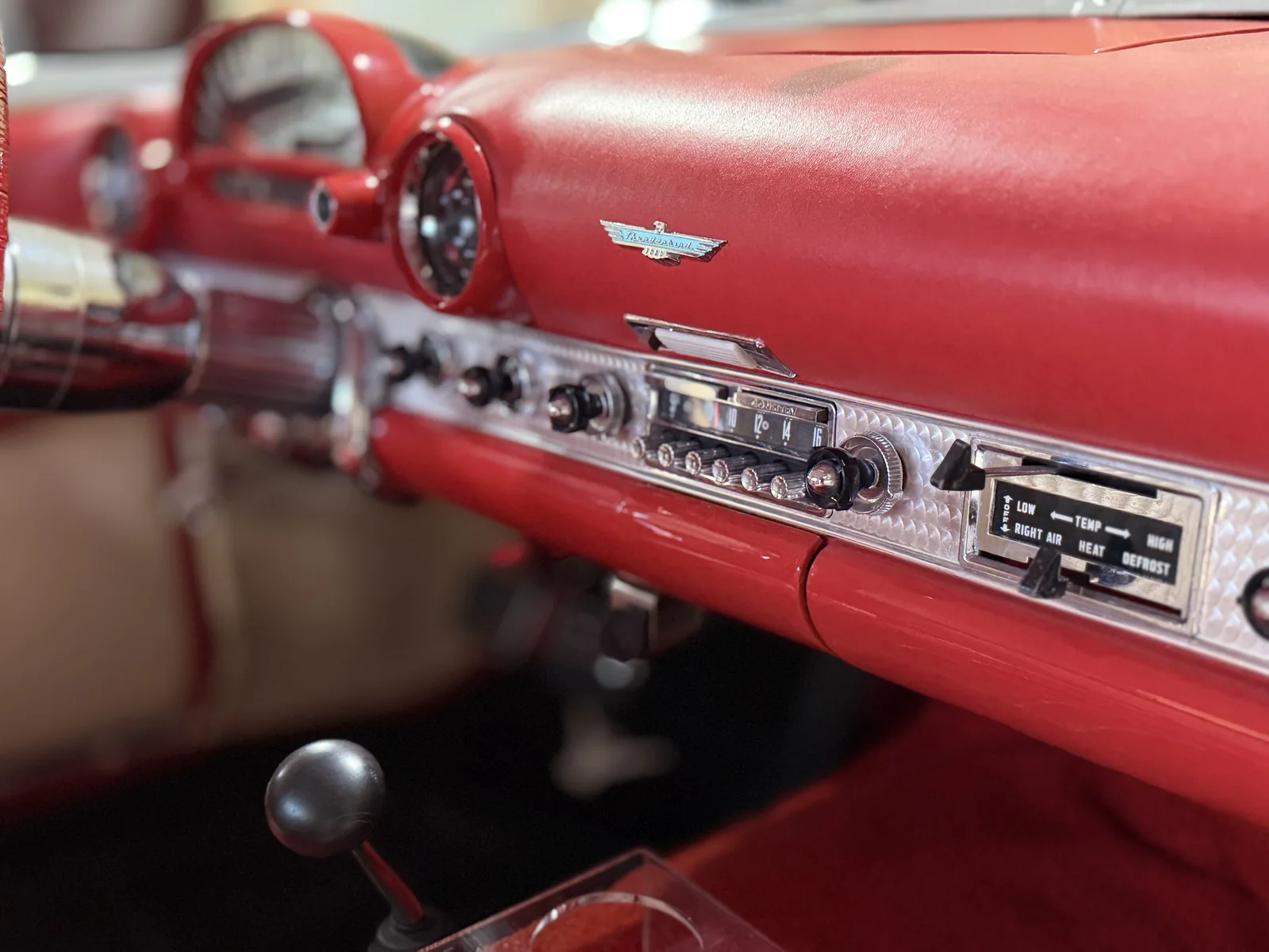 Classic Ford Thunderbird red dashboard and chrome after interior detailing