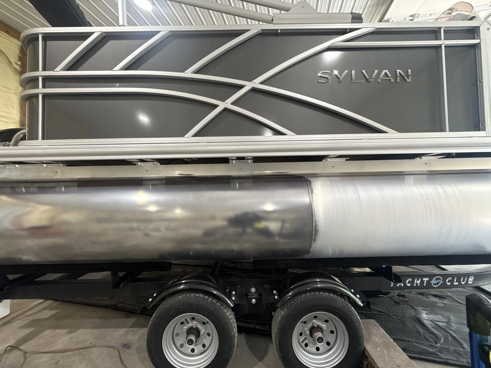 Pontoon boat tube with a 50/50 before and after aluminum polish