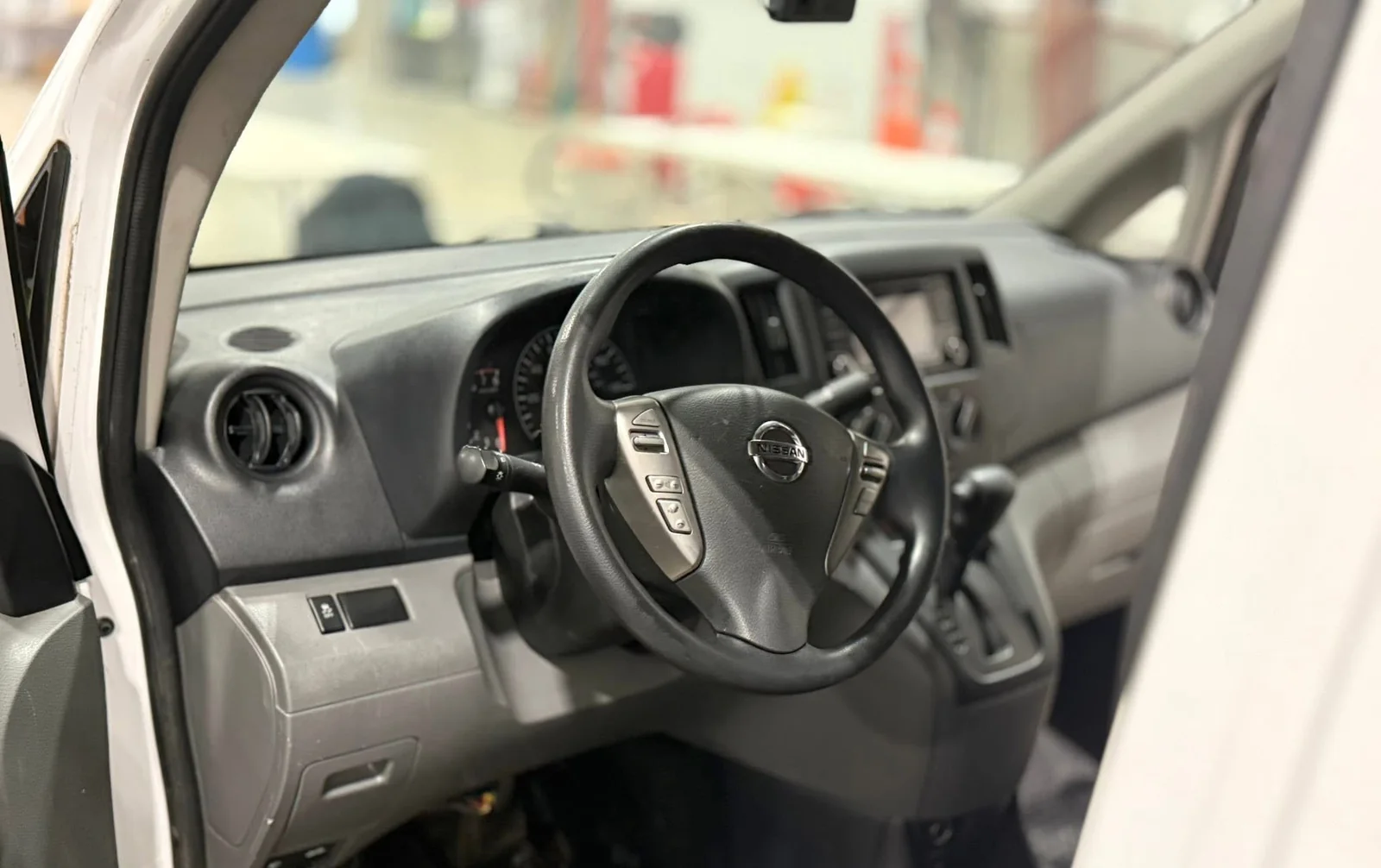 Work van dashboard and steering wheel after a fleet interior detail